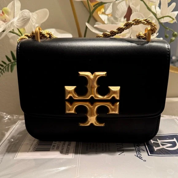 Tory Burch Black Crossbody Bag with Gold Accent - Picture 2 of 5
